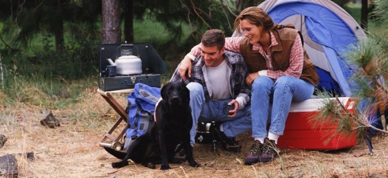 Couple with Dog Camping