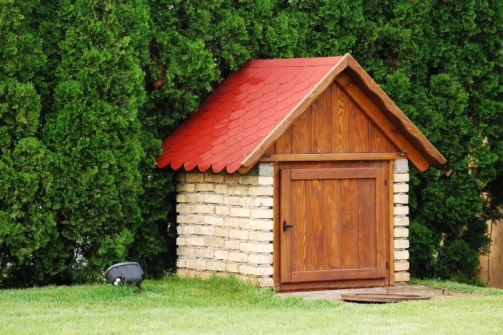 36. Red Roofed Brick Kennel