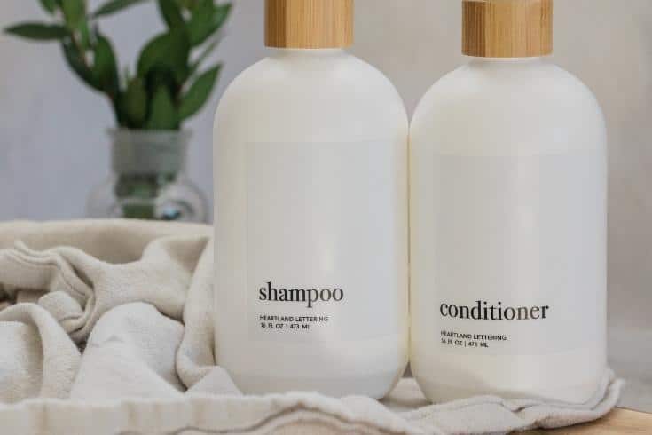 Shampoo and Conditioner Bottles on a Table